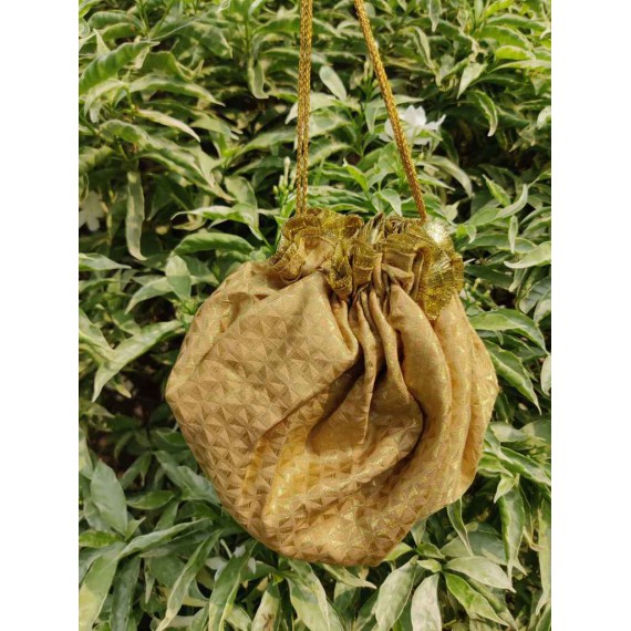 Damyanti gold potli bag