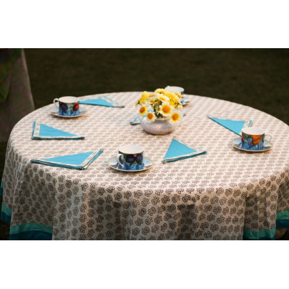 White and blue round table cloth for six