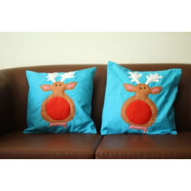 Blue reindeer cushion covers