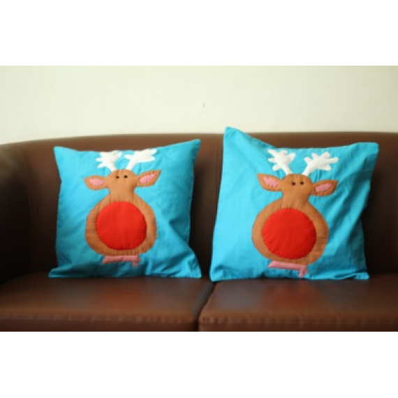 Blue reindeer cushion covers