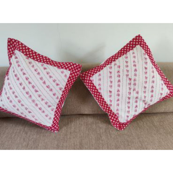 Red and white cushion covers